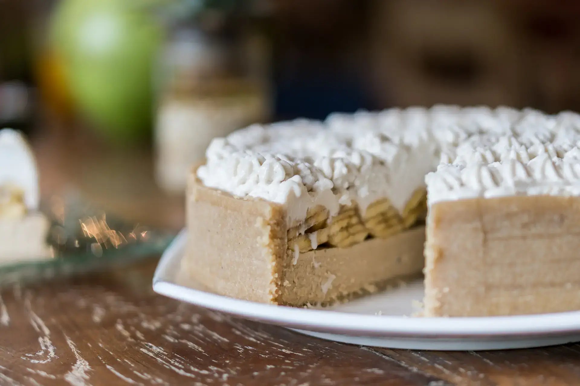 Vegan Bonefee pie from Alchemy on wood table with recipe in Bali Vegan Book